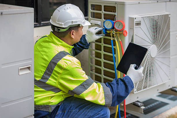 Professional Air Duct Cleaning technician working in El Granada, CA